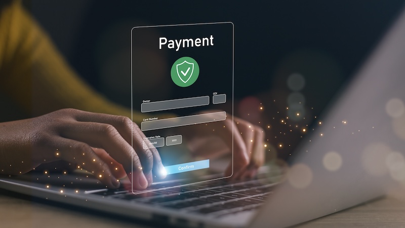 Online Payment graphic with hands on a keyboard and secure payment icon